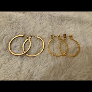 Two pairs of gold tone hoops